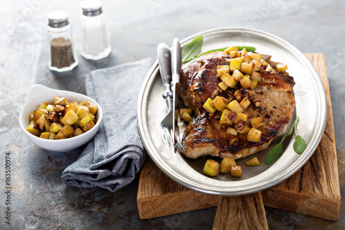 Pork chops with apples and walnuts photo