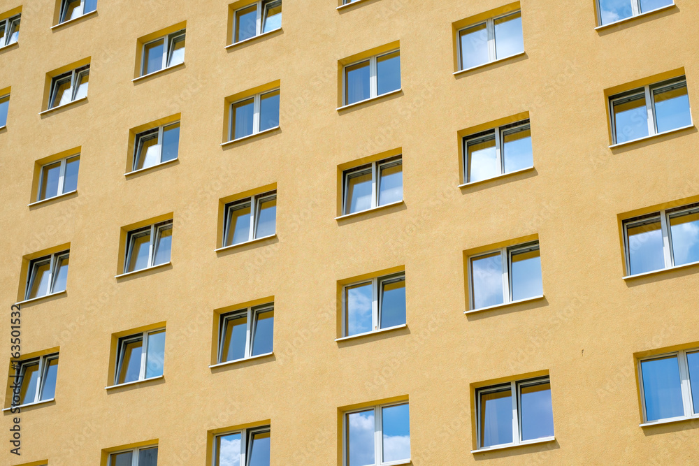 yellow house facade , windows, building exterior windows, building exterior
