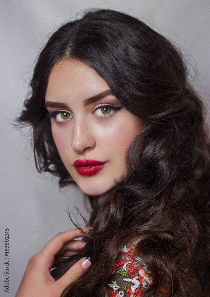 Professional makeup for curly brunette