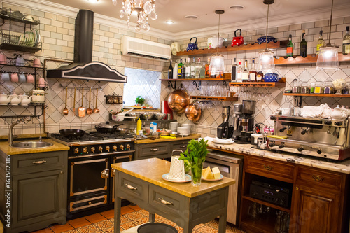 Interior of restaurant in country style. cozy restaurant in French style with empty frames for paintings and photographs on walls