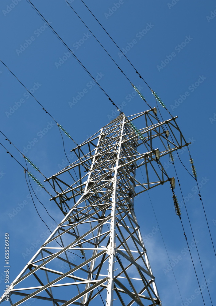 Steel support power line on blue sky background Steel support power line on blue sky background