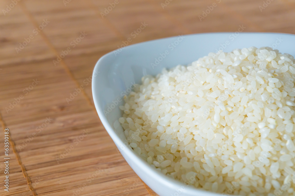Raw rice in a plate Raw rice in a plate