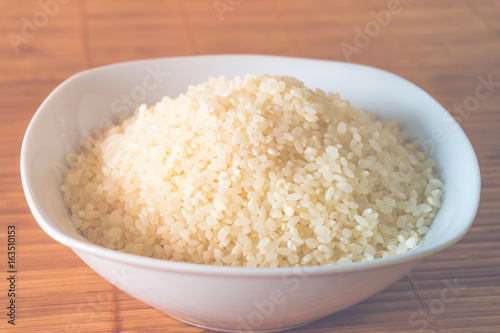 Raw rice in a plate
