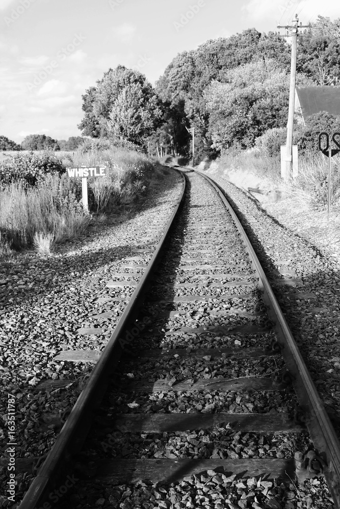 train tracks disappear in distance vanishing  point perspective