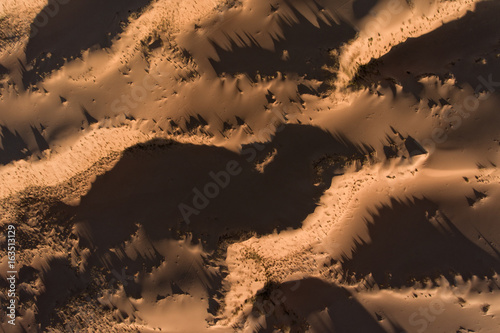 Aerial view of massive sand dunes in the arid region of the Northern Cape, South Africa. photo