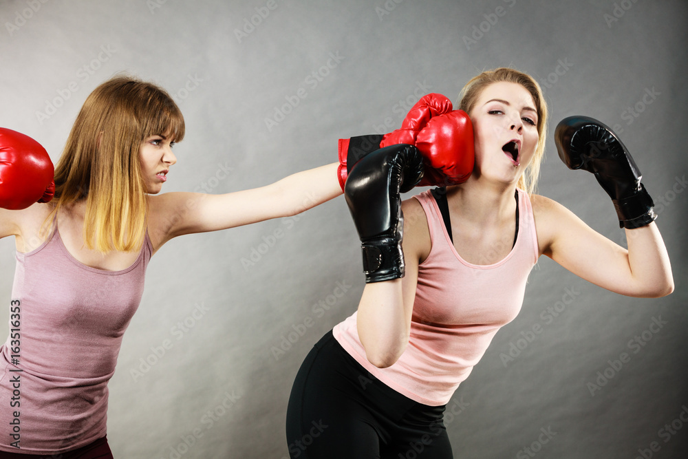 Agressive women fighting boxing with female Agressive women fighting boxing with female