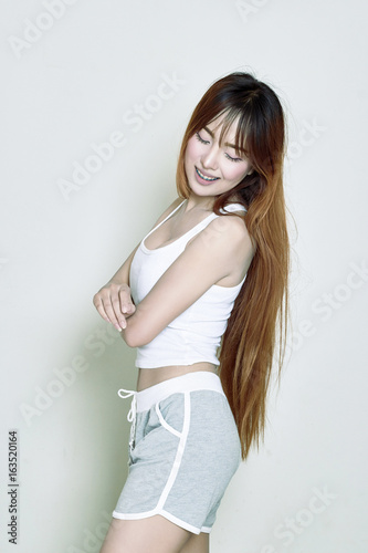 Asian woman happy in her body shape