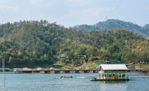Resort wooden home raft floating and mountain fog on river kwai at sai yok,kanchanaburi,thailand
