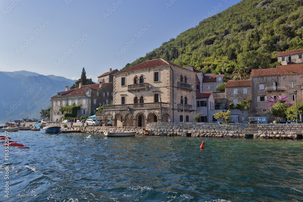 Small towns on the shore of the Kotor Bay attract many tourists