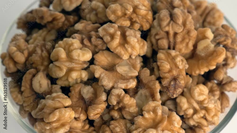 The nut walnut rotates on the turntable. The nut walnut rotates on the turntable.