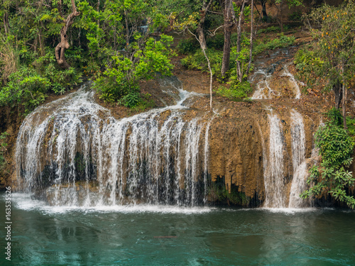 Fototapeta Naklejka Na Ścianę i Meble -  Sai Yok Yai waterfall beside the Kwai river