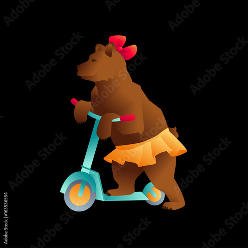 Circus trained wild animals performance isolated on black. bear on a scooter