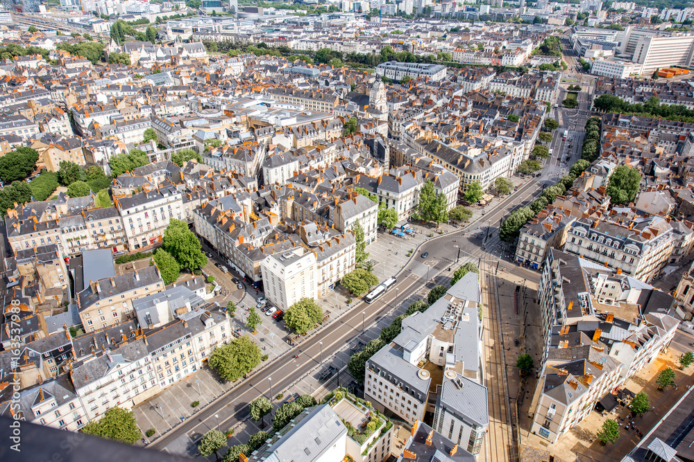 Aerial cityscape view with beautiful buildings and in Nantes city during the sunny weather in France