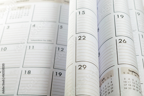 Blurred and focused folded calendar pages