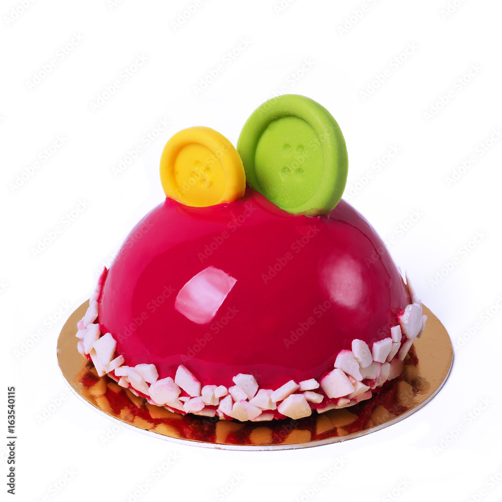 French mousse cake covered with cherry glaze isolated on white. Red modern  European dessert with chocolate decoration of yellow and green button Stock  Photo | Adobe Stock