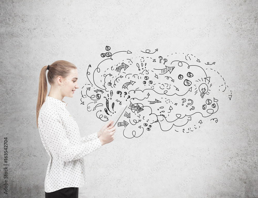 Blond woman with a tablet and her plan Blond woman with a tablet and her plan