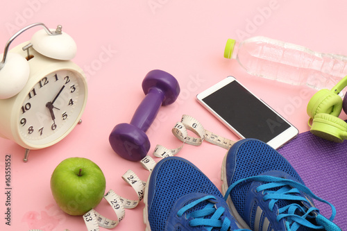 sport, fitness, healthy lifestyle and Accessories for sports, lying on the floor in a fitness club © sittinan