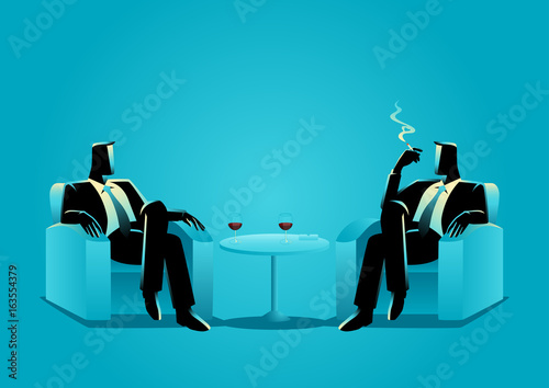 Two businessmen sitting on sofa