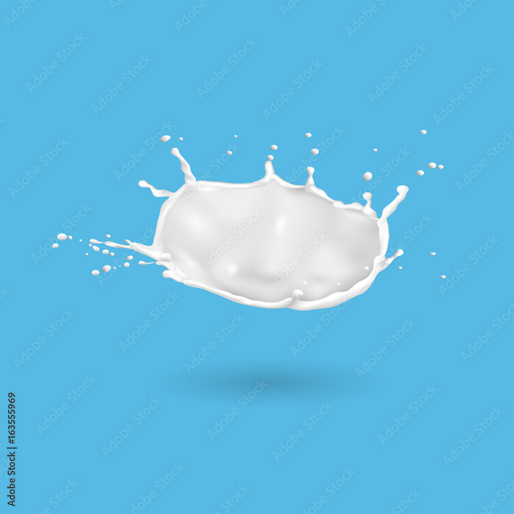 Fresh milk splash isolated on blue background Fresh milk splash isolated on blue background
