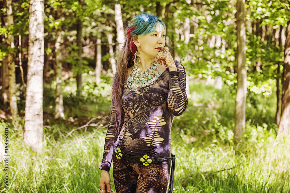 Hippie girl enjoying summer nature