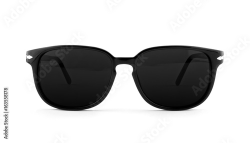 Cool sunglasses isolated on white background. In black plastic frame. Front view. Close up.