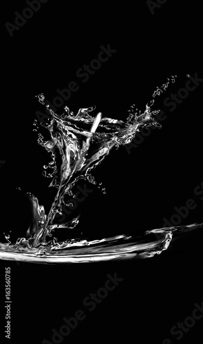 Silhouette of a calla lily made from water on black. 