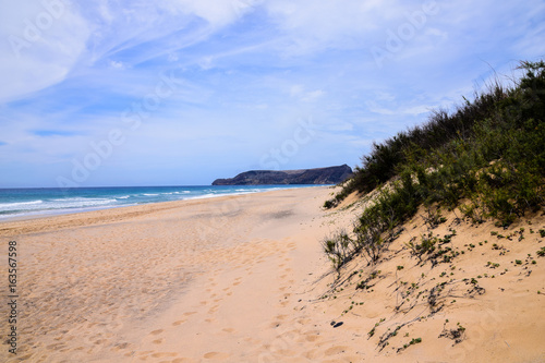 Fototapeta Naklejka Na Ścianę i Meble -  Beach at Porto Santo Island looking south towards Ilheu da Cal
