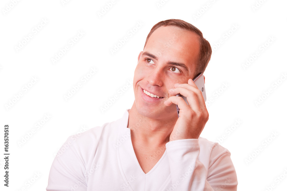 portrait of young man talking on mobile phone on white background. portrait of young man talking on mobile phone on white background.
