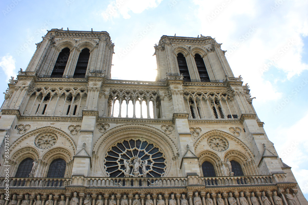 Notre Dame de Paris, medieval catholic cathedral on Cite in Paris, France.  French gothic architecture historical building, one of the most famous church building in the world.