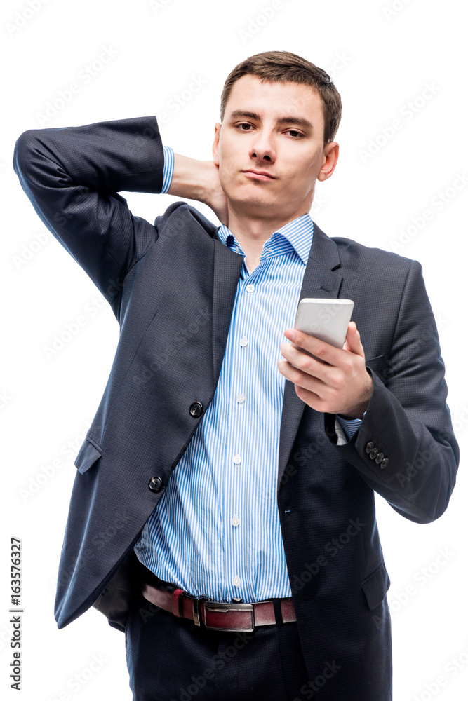 Tired businessman with phone in hand on white background Tired businessman with phone in hand on white background