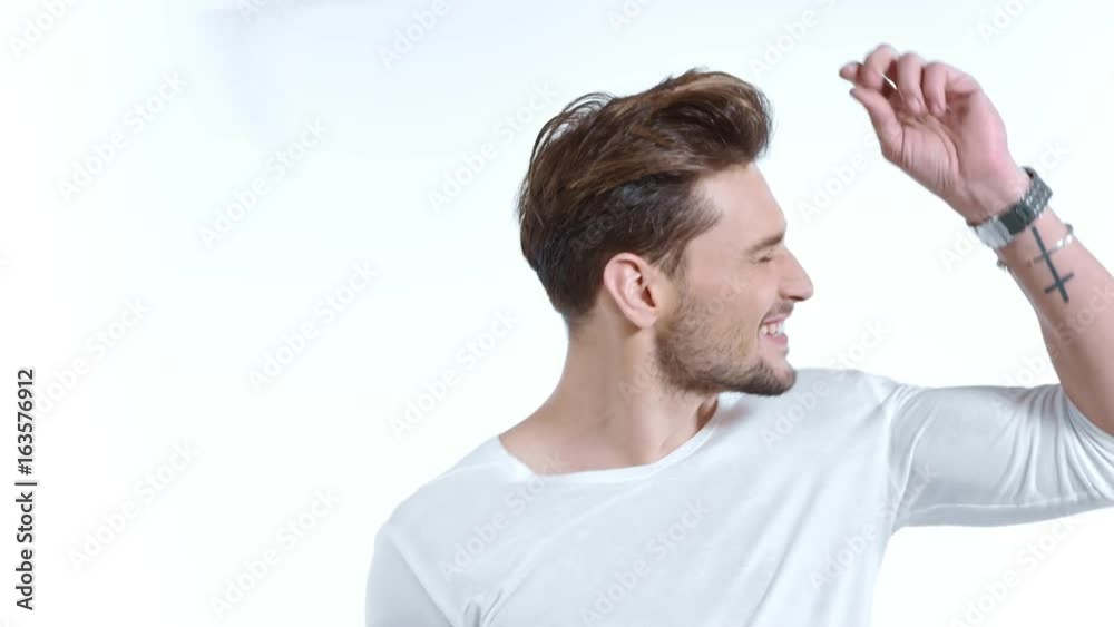 Handsome young man posing on white background - isolated Handsome young man posing on white background - isolated