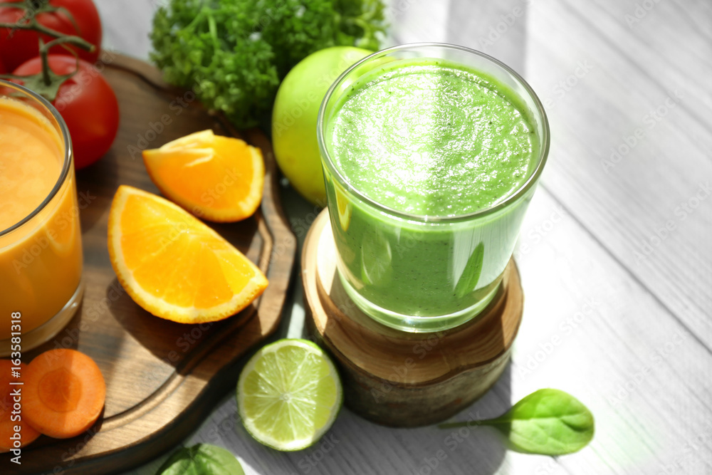 Fresh smoothies, vegetables and fruits on table Fresh smoothies, vegetables and fruits on table