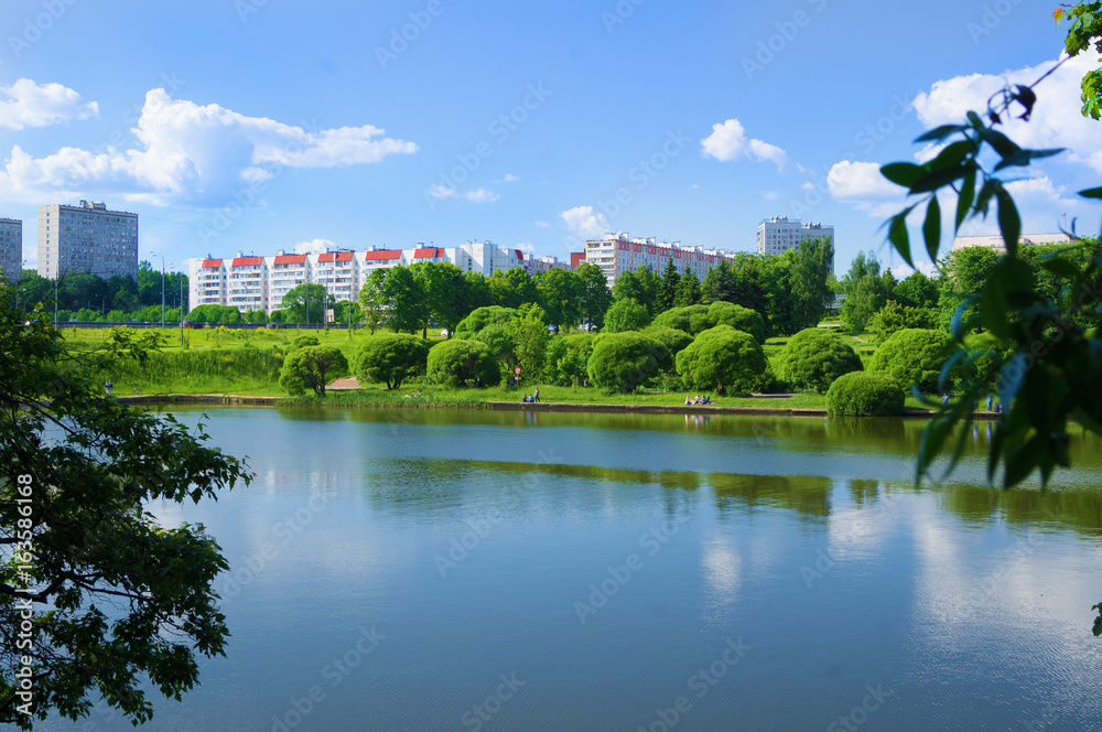 A lake in the center of a small town A lake in the center of a small town