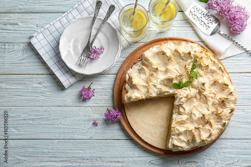 Fototapeta Naklejka Na Ścianę i Meble -  Yummy lemon meringue pie on wooden table