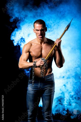 fitness muscular male model with axe