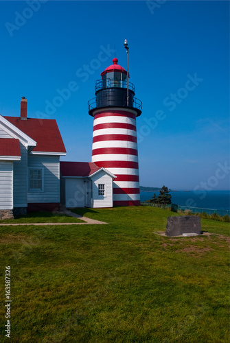 Quoddy Head State Park includes the historical West Quoddy Head lighthouse on the easternmost location of the Untied States. photo