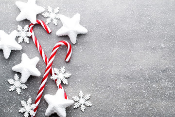 Candy cane. Christmas decors with gray background.