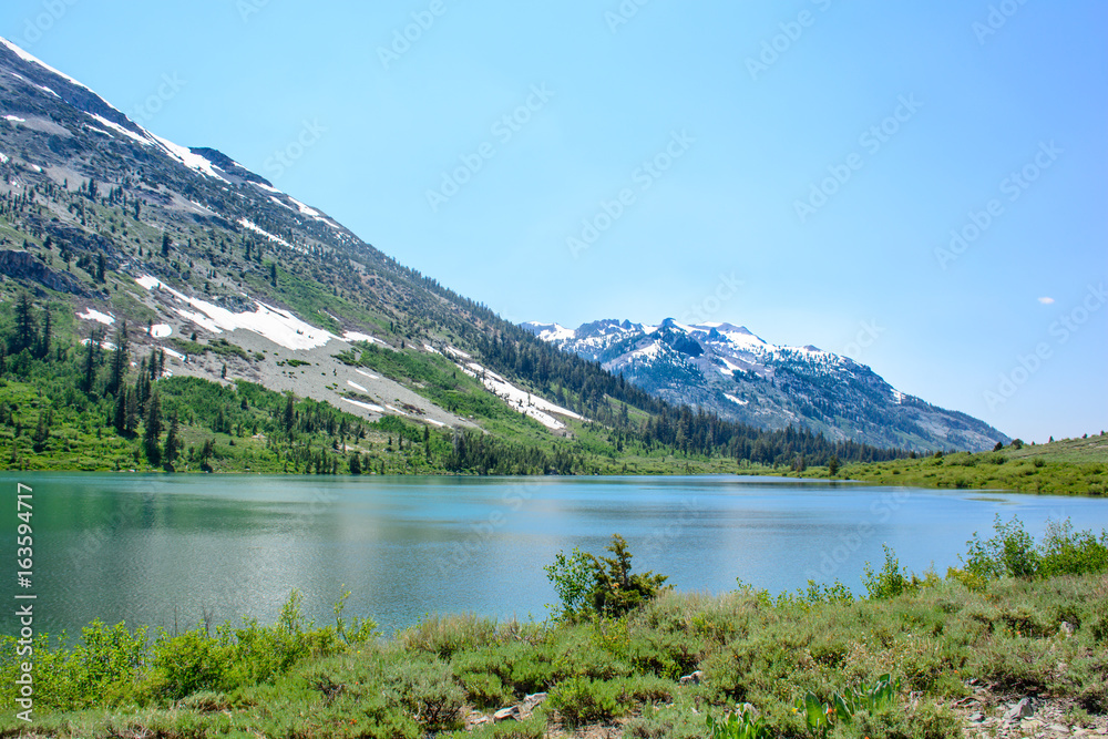 Glacier Mountain with Lake in the Summer with green
