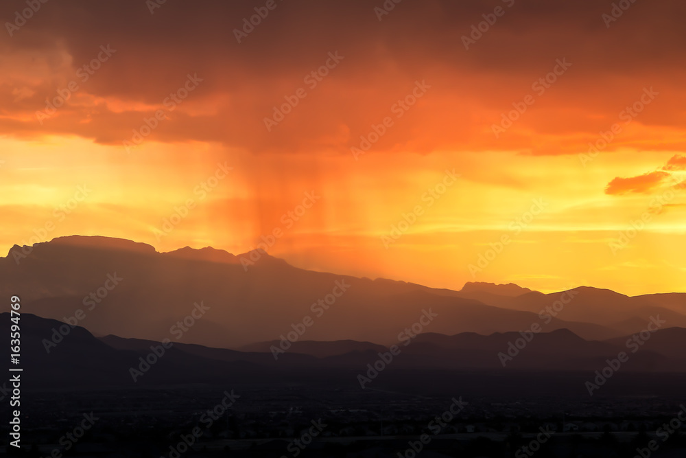 Fototapeta premium Moonsoon Over Western Arizona Sunset