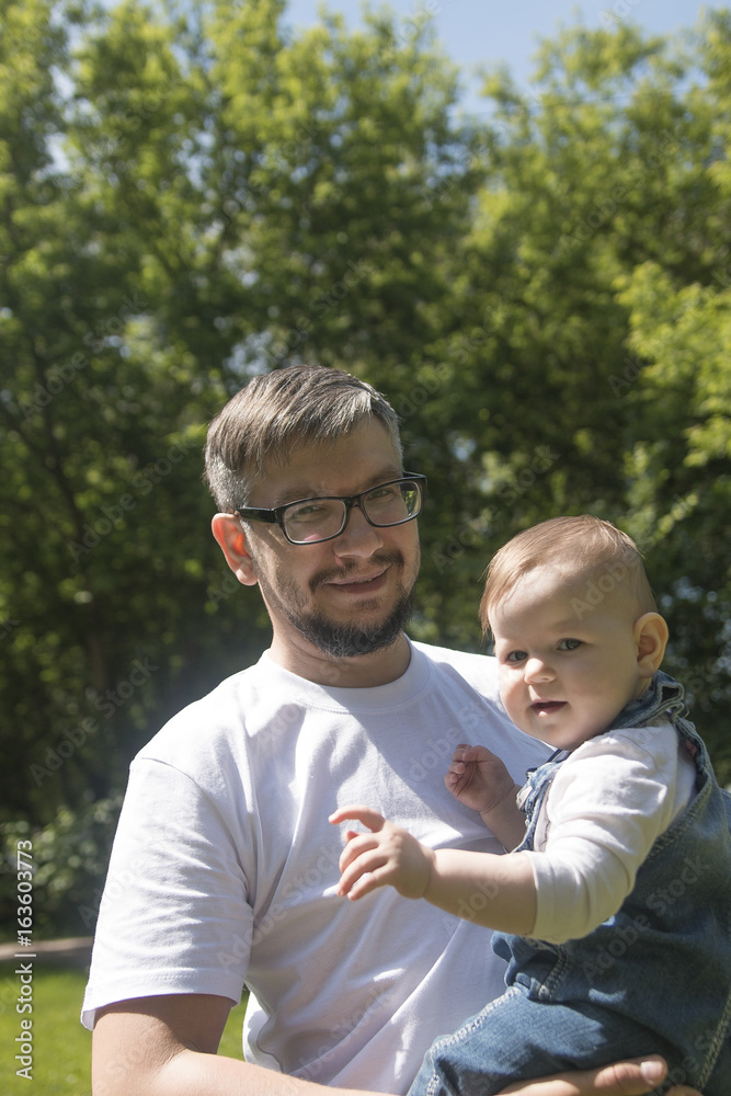 Fototapeta premium Father plays with the child