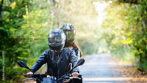 couple biker riding motorcycle