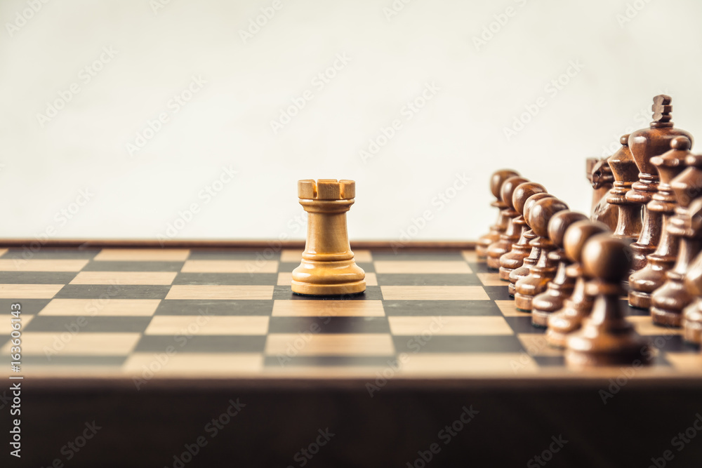 Chess on board  white backgroung. Confrontation concept
