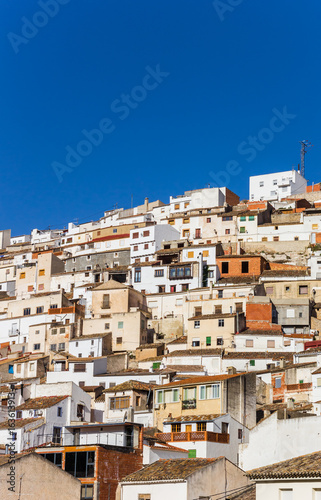 White houses on the steep hill of Alcala del Jucar © venemama
