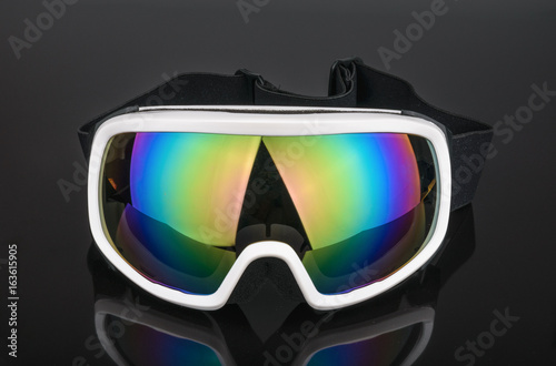 ski goggles on black background
