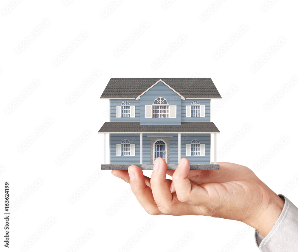 Mortgage concept by house from in hand Mortgage concept by house from in hand
