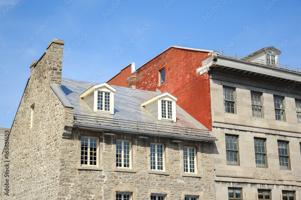 An old historical building with the large windows in the old port of Montreal on Jacques Cartier place.Place Jacques-Cartier, Canada