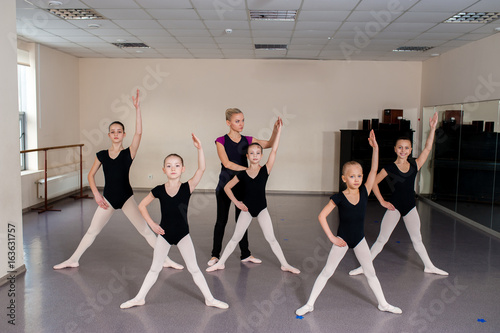 The choreographer teaches children dances.