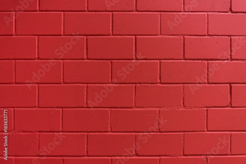 Intensive red painted brick wall for background