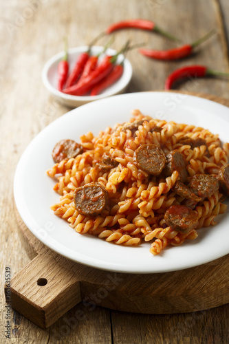 Pasta with sausage and tomato sauce