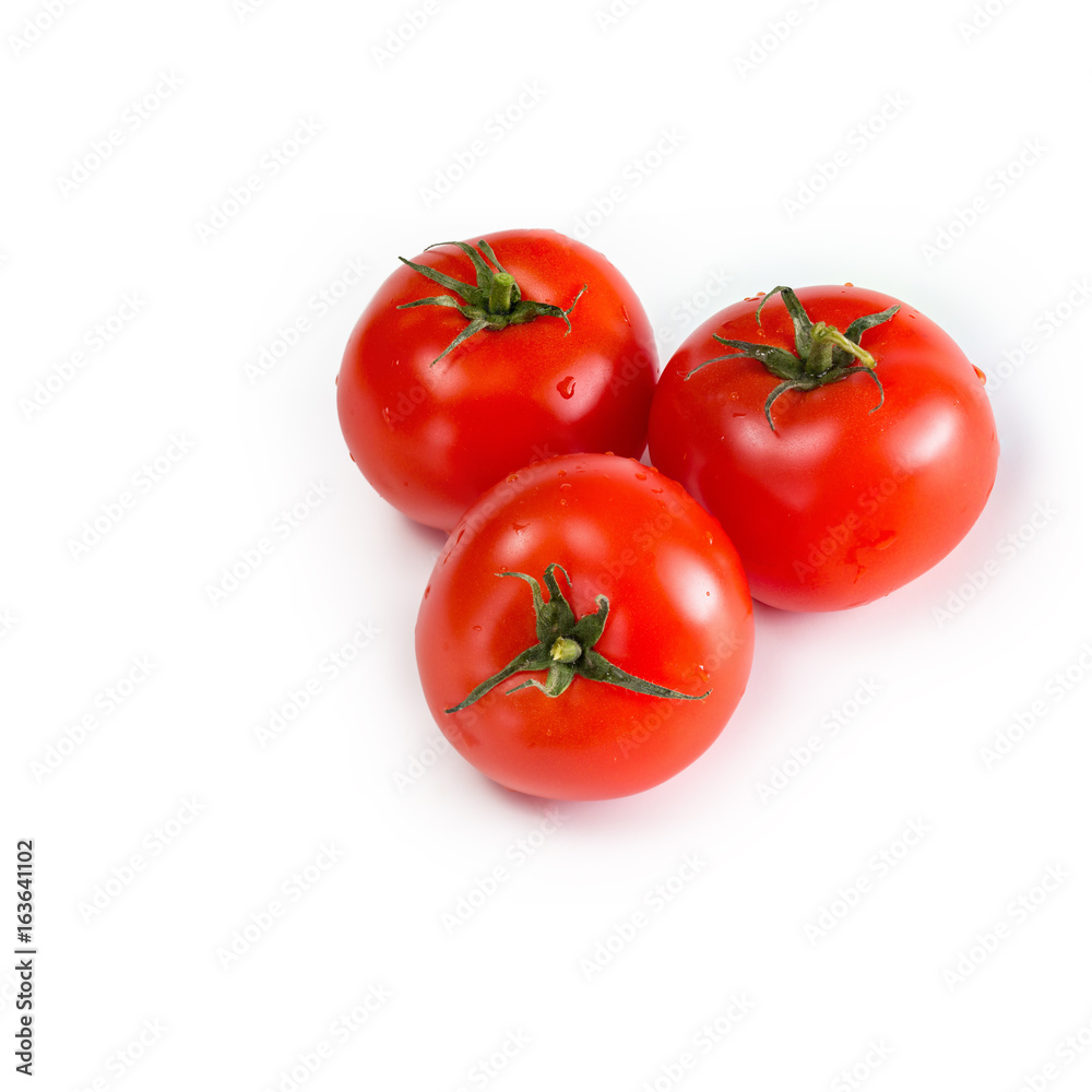 Red fresh tomatoes on a white isolated background